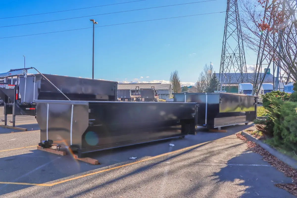 Roll-off dumpster ready for waste disposal at job site for 12 Yard Dumpster Rental in Grosse Ile
